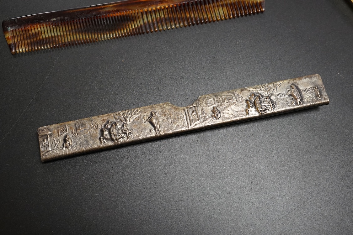 A pair of mother of pearl handled gilt metal lorgnettes in a leather case and a comb housed in an antimony case, largest 16cm in length